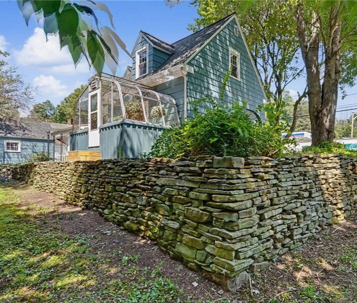 Back yard with greenhouse